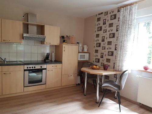 Η κουζίνα ή μικρή κουζίνα στο Ferienwohnung Mittelmühle