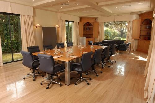 a large conference room with a long table and chairs at Villa Jerez in Jerez de la Frontera