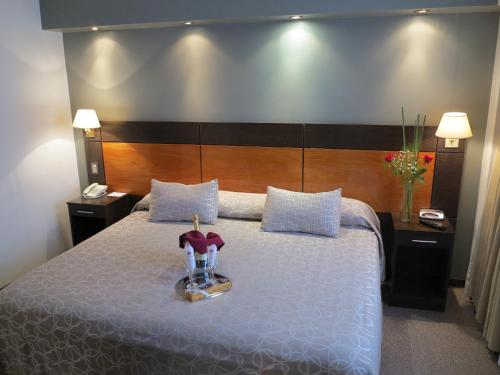 Postel nebo postele na pokoji v ubytování Hotel Corregidor