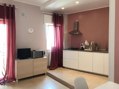 Kuchyň nebo kuchyňský kout v ubytování Apartment Antonella