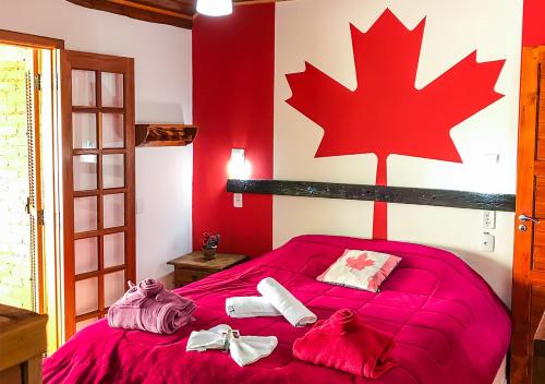 Giường trong phòng chung tại Pousada Cabanas no Mundo