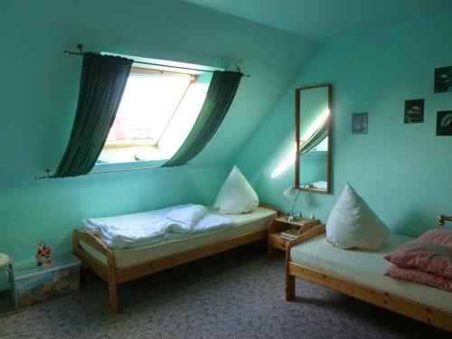 Posteľ alebo postele v izbe v ubytovaní Huus Westerdiek