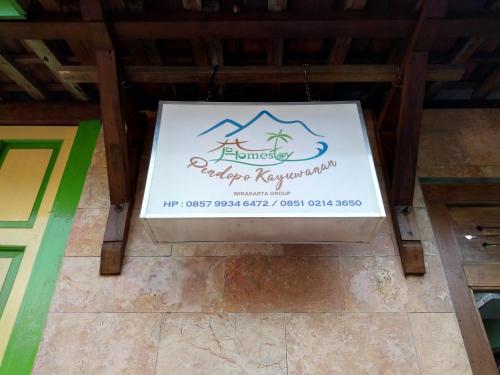 a sign for a kitchen repurchase at Pendopo Kayuwanan Syariah Near Terminal Giwangan in Yogyakarta
