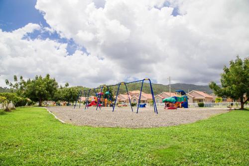 Zona de juegos infantil en The Gulf Retreat Oasis
