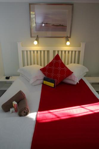 Ένα ή περισσότερα κρεβάτια σε δωμάτιο στο Twins Guesthouse NO LOAD SHEDDING