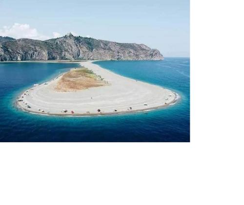 an island in the middle of the ocean at Al Saliceto Hotel in Patti