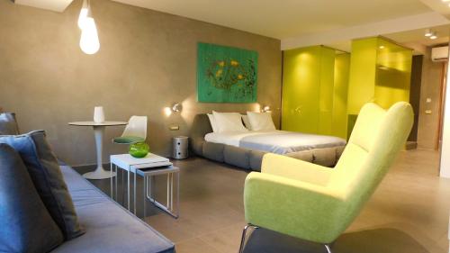 Ένα ή περισσότερα κρεβάτια σε δωμάτιο στο 101 Adrianou Apartments