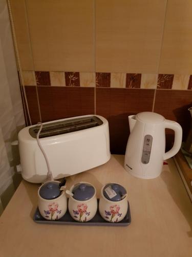 Utensilios para hacer té y café en Apartment A&D