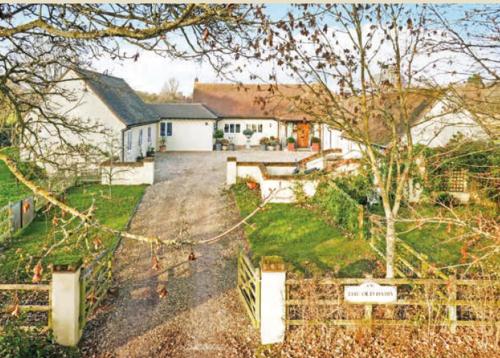 an aerial view of a house with a yard at The Old Dairy (Chute Forest) in Andover
