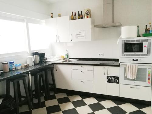 Kuchyň nebo kuchyňský kout v ubytování Hostel A2C