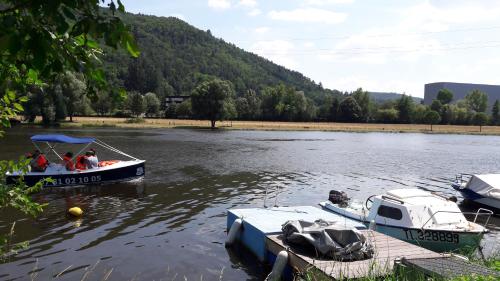 a group of people in a boat on a river at Bordl'o in Aurec-sur-Loire