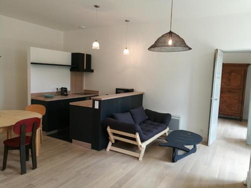Μια τηλεόραση ή/και κέντρο ψυχαγωγίας στο Gîte Maison de l'Abbé