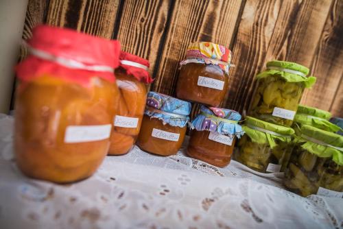 a group of jars of jam on a table at Lochererhof in Appiano sulla Strada del Vino