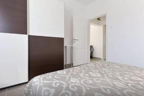 Katil atau katil-katil dalam bilik di Marija Apartment