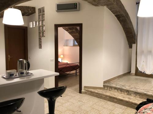Gli Archi في مونتيفياسكون: اطلالة غرفة مع صالة معيشة
