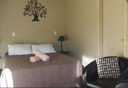 Katil atau katil-katil dalam bilik di Oamaru TOP 10 Holiday Park