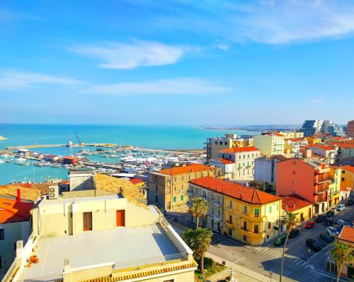 an aerial view of a city with a harbor at Pensione Al Pescatore in Termoli
