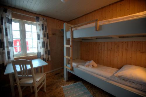 Cama o camas de una habitación en Holmvik Brygge Nyksund