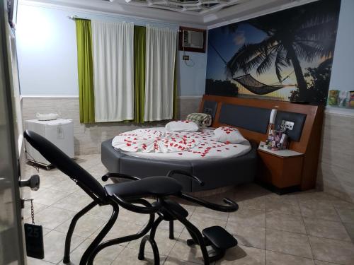 เตียงในห้องที่ Motel Mont Blanc Gru