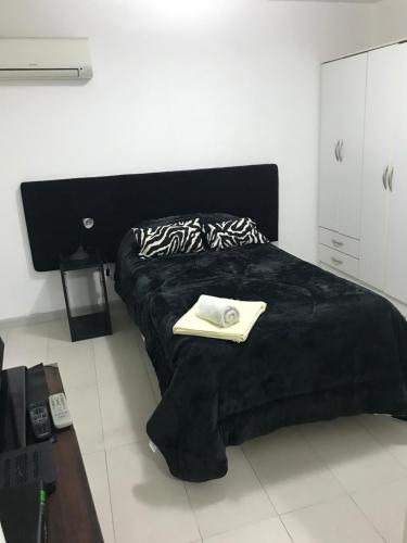 Een bed of bedden in een kamer bij Lombardo 126