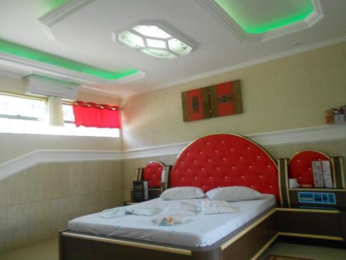 Tempat tidur dalam kamar di Motel Morumbi (Adults Only)