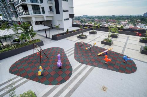 an aerial view of toy playgrounds on top of a building at Perfect Getaway @Vivacity in Kuching