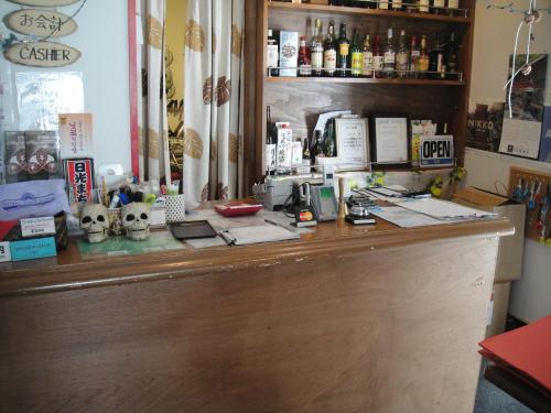 a bar in a restaurant with a counter with a coffee maker at Nikko Park Lodge Tobu Station in Nikko