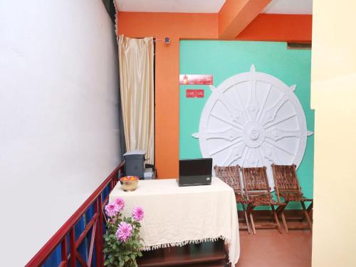 Un ou plusieurs lits dans un hébergement de l'établissement Konark Homestay