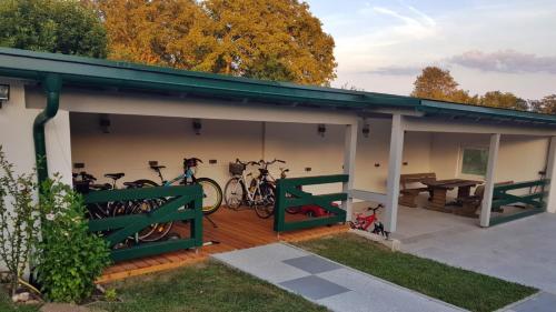 a garage with bikes parked on a deck at Haus Floresa in Lutzmannsburg