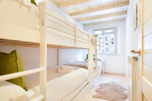 Posteľ alebo postele v izbe v ubytovaní Val de Ruda Luxe 60 by FeelFree Rentals