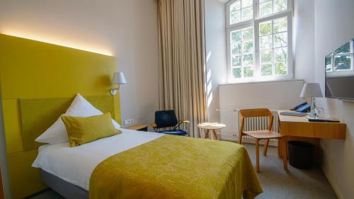 Ліжко або ліжка в номері Katholisch-Soziales Institut