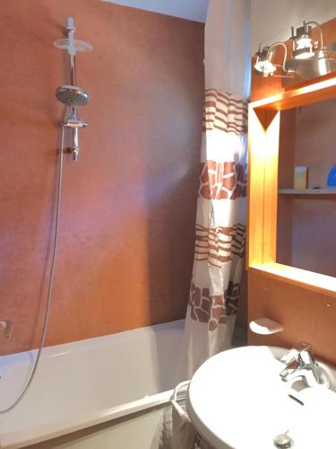 a bathroom with a shower and a sink at MyHome - Plein Soleil 47 - Studio cabine 4 pax skis aux pieds Val Claret in Tignes