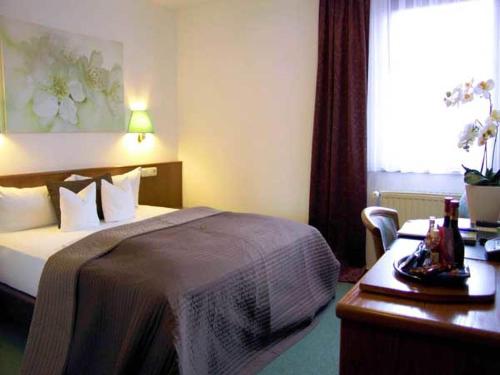 Hotel Promenadenhofにあるベッド