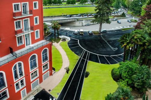 an aerial view of a building and a park at Grand Hotel Gallia & Londres in Lourdes