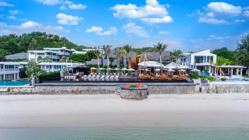 a view of a resort from the water at The Yana Villas Hua Hin in Hua Hin