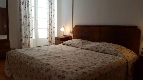 Säng eller sängar i ett rum på Family Desin Apartments