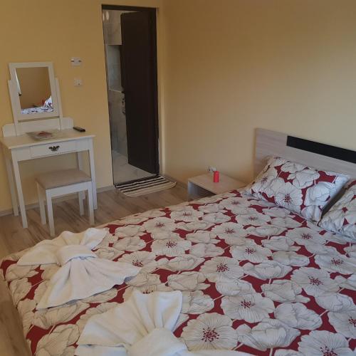 Ένα ή περισσότερα κρεβάτια σε δωμάτιο στο Guest House Ileana