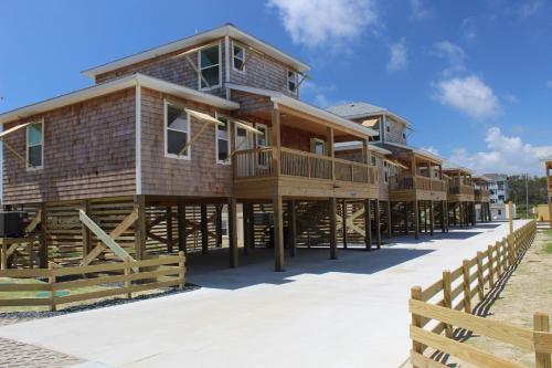 a large wooden house on the beach at Whalebone Ocean Cottages by KEES Vacations in Nags Head