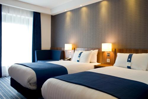 Postelja oz. postelje v sobi nastanitve Holiday Inn Express Dunstable, an IHG Hotel