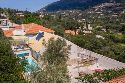 an aerial view of a house with a pool at Villa Pilali in Kefallonia