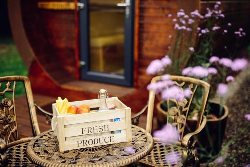 a crate of fresh produce sitting on a table at Delny Glamping and Farm Animals in Invergordon