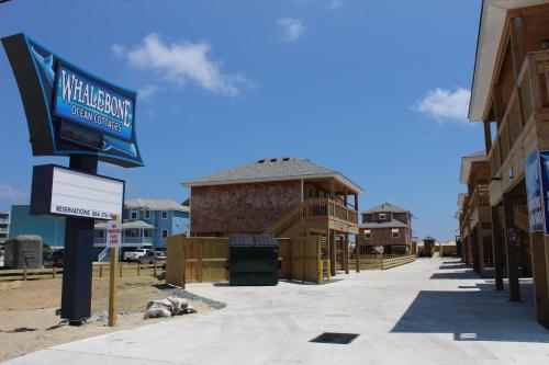 a building under construction with a sign in front of it at Whalebone Ocean Cottages by KEES Vacations in Nags Head