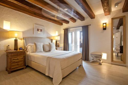 Postel nebo postele na pokoji v ubytování Hotel Boutique Casa del Coliseo