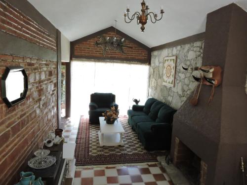 Posezení v ubytování Cabañas- Casas España