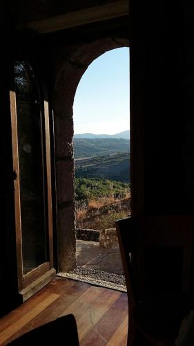 an open window in a room with a view at La Ripa in Rocca San Felice