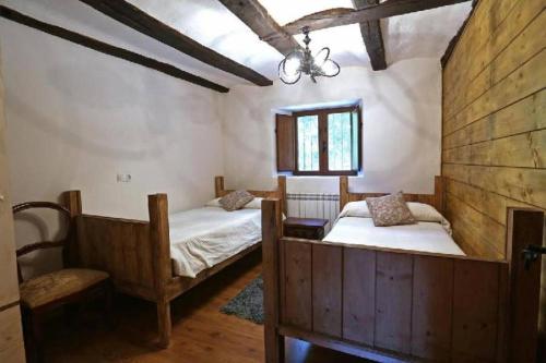 Postel nebo postele na pokoji v ubytování Casa Rural Jaxo
