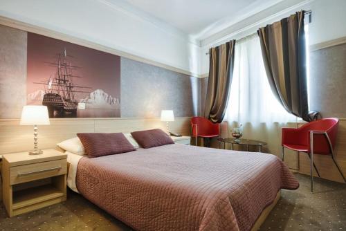 Ein Bett oder Betten in einem Zimmer der Unterkunft Hotel Galija