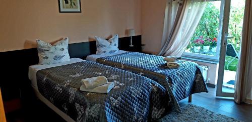 Un pat sau paturi într-o cameră la Rooms Stanic
