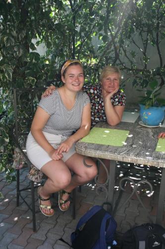 two women are sitting at a table at Sofia in Kutaisi