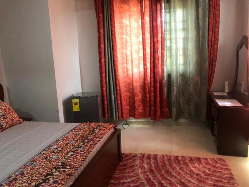 Katil atau katil-katil dalam bilik di PLUS 33 HOTEL